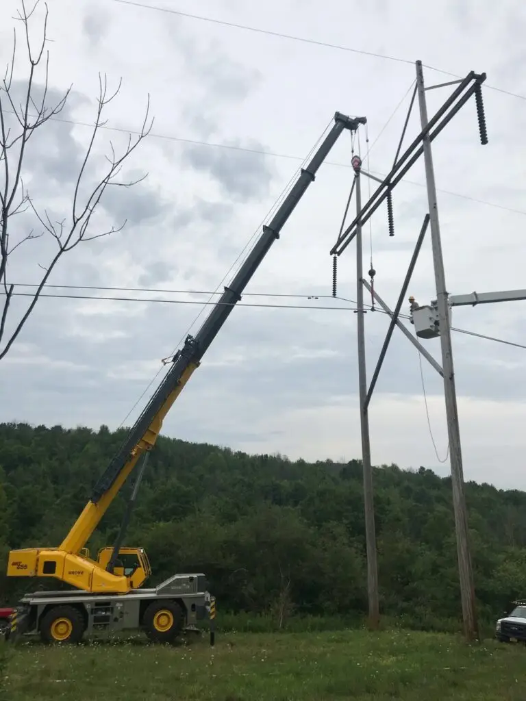 High Voltage power line tower structure emergency repair by Sky Point Crane's rough terrain near Renova, PA