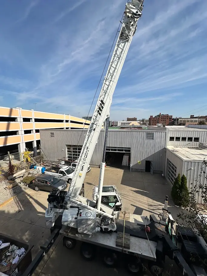 Johnstown, PA HVAC lift with swing cab crane
